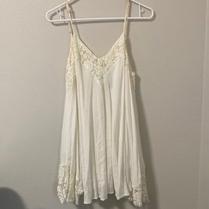 White Flowy Dress with Lace Detail by Paper Heart